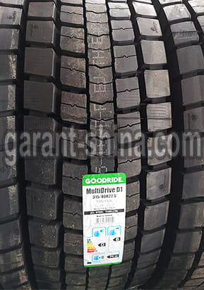 Goodride MultiDrive D1 (приводная) 315/80 R22.5 156/153L 18PR - Фото протектора с этикеткой вблизи